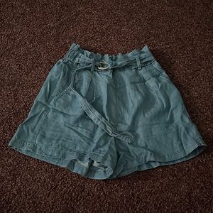 Shorts with belt attached